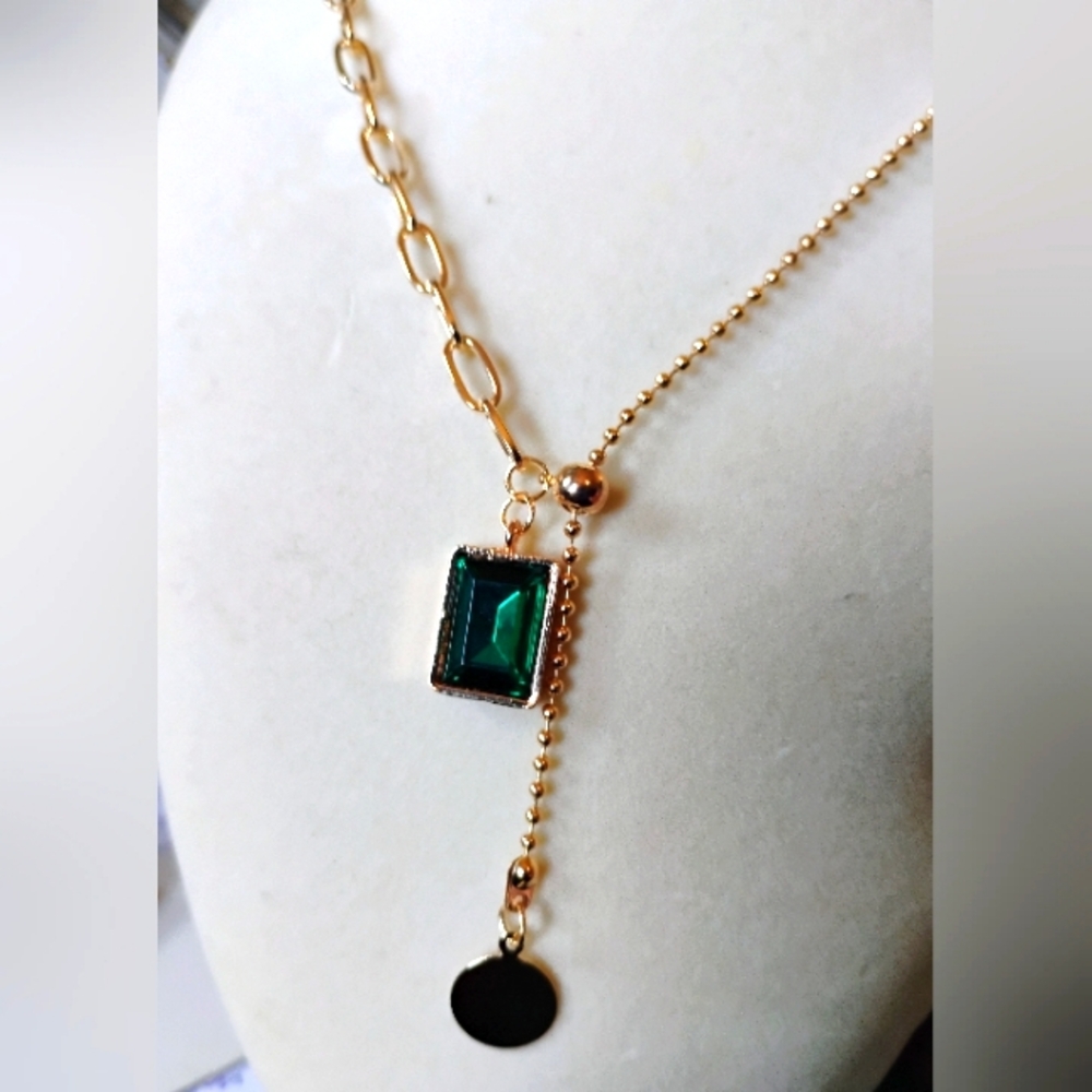 Adjustable emerald color charm necklace